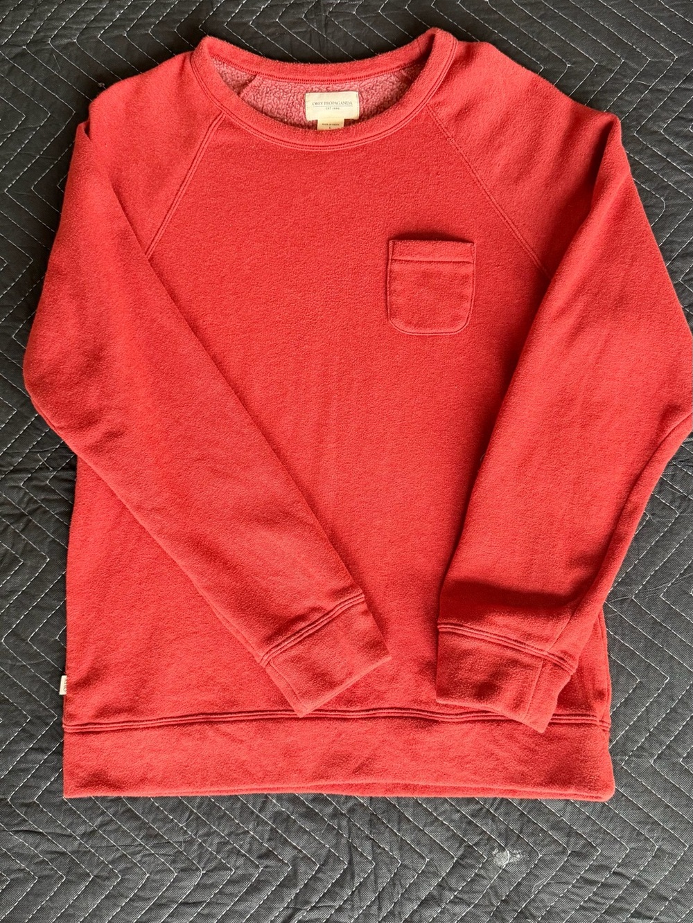 Obey Men's orangeCrewneck Pocket Sweatshirt